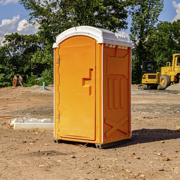 what is the cost difference between standard and deluxe portable restroom rentals in Fairland